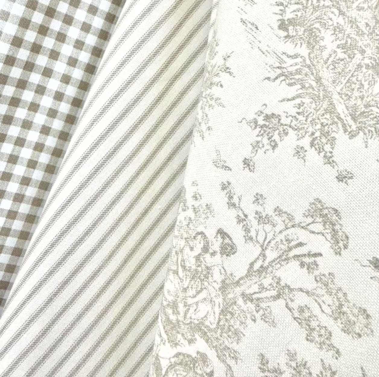 Oatmeal toile fabric with coordinating gingham check and ticking stripe in neutral greige cotton