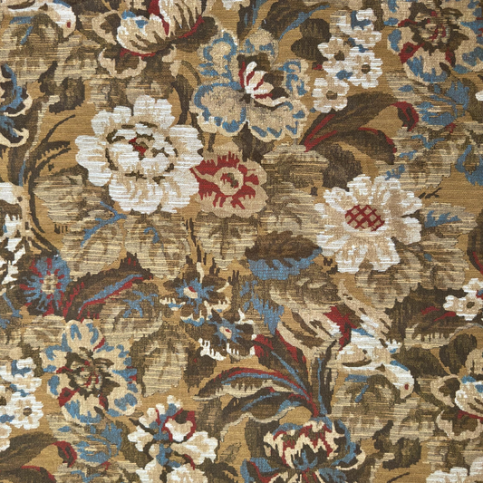 The image is a close-up of a textured fabric with a floral pattern. The fabric has a mix of brown, white, and blue colors, creating a visually appealing and intricate design.