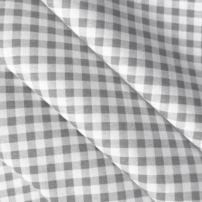 a close-up view of a fabric with a checkered pattern in shades of gray and white.