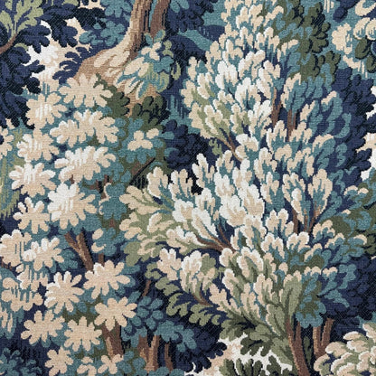 The image is a close-up of a detailed tapestry or fabric with a complex pattern of various shades of blue, green, and white. The pattern features a variety of textures and shapes, including leaves, flowers, and branches, creating a visually striking and intricate design.