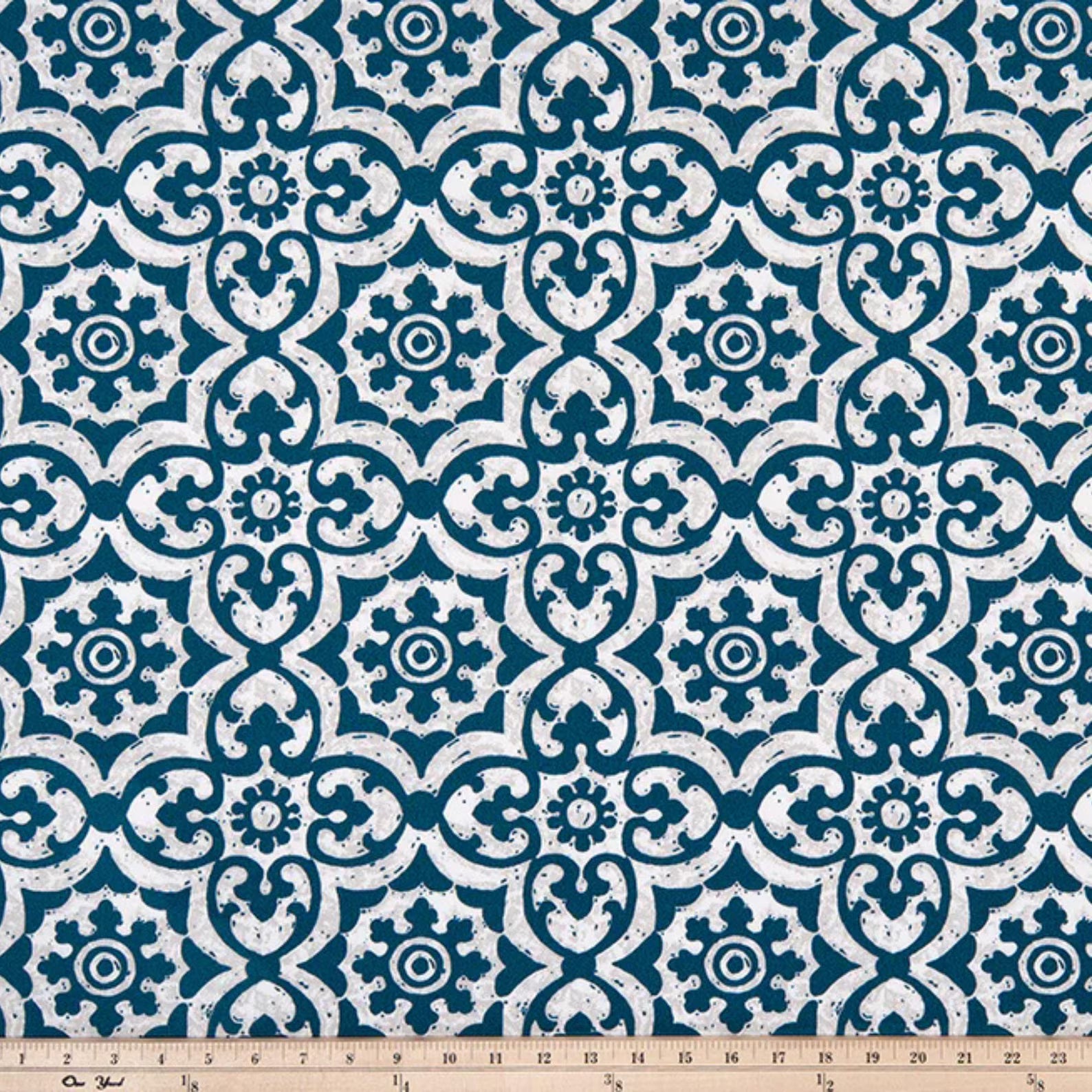 Blue outdoor fabric with intricate geometric tile design, exterior textile for cushions and upholstery
